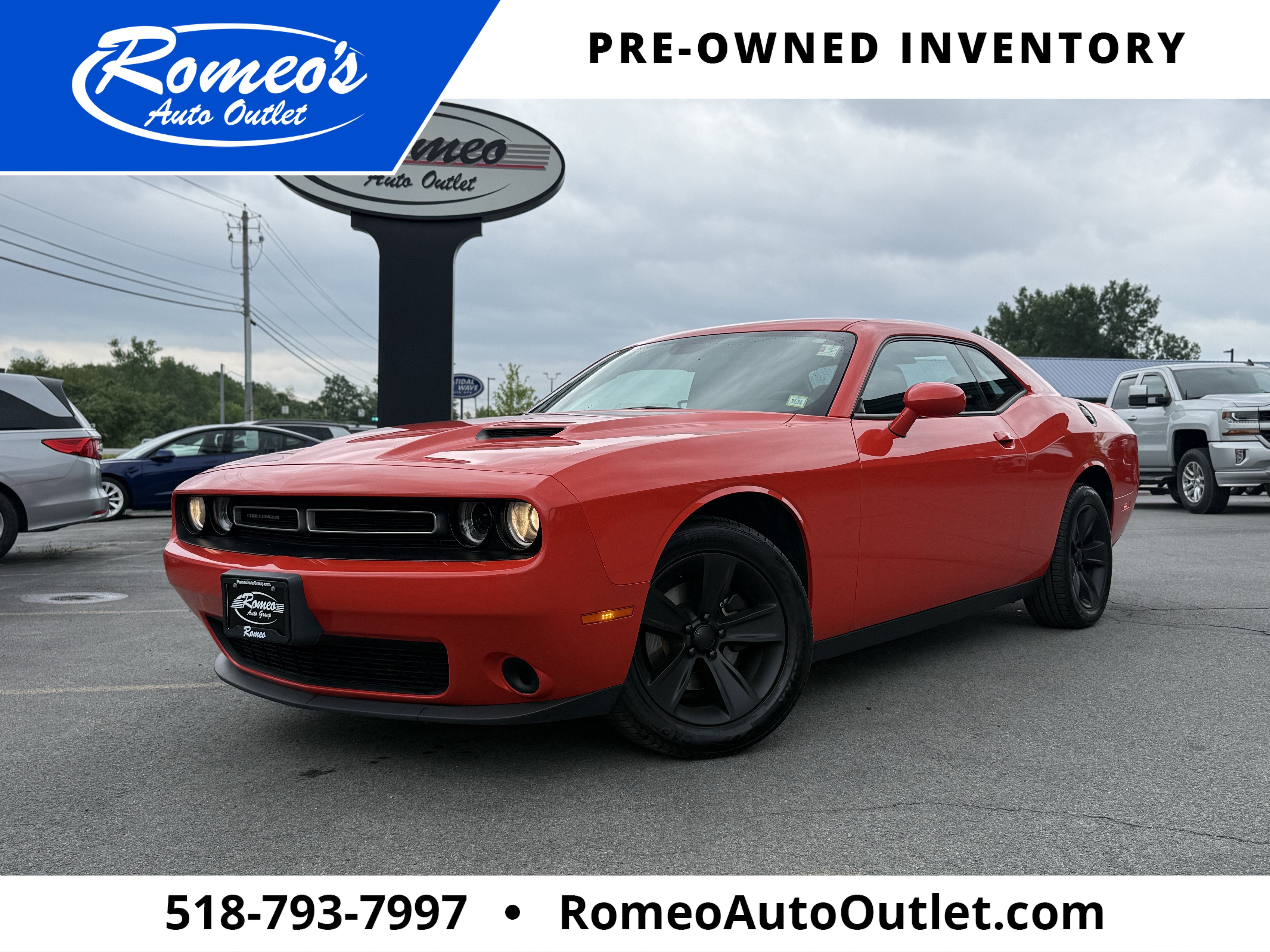 2020 Dodge Challenger SXT in Go Mango! — front three-quarter view