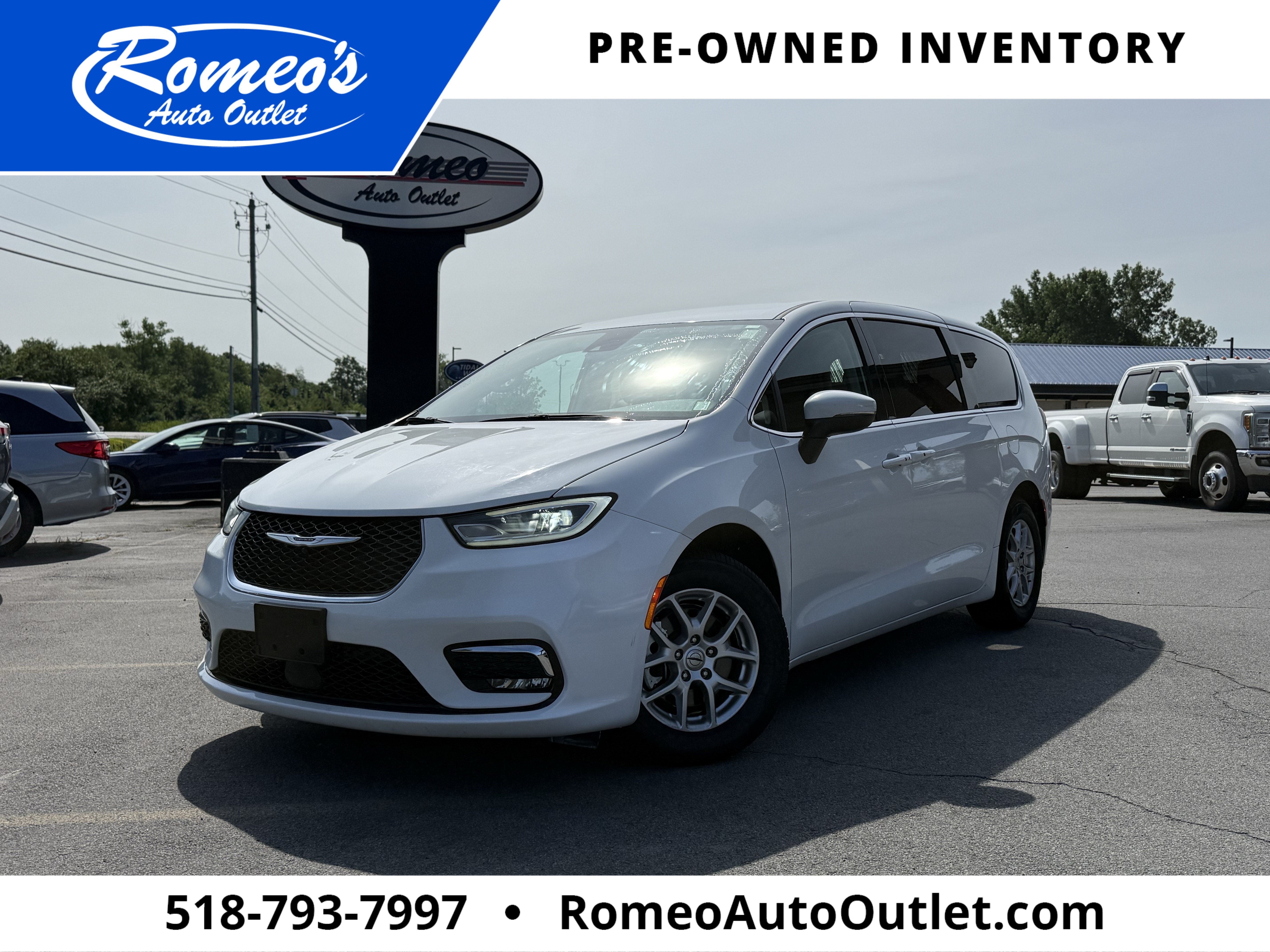 2023 Chrysler Pacifica Touring L in Bright White Clearcoat — front three-quarter view