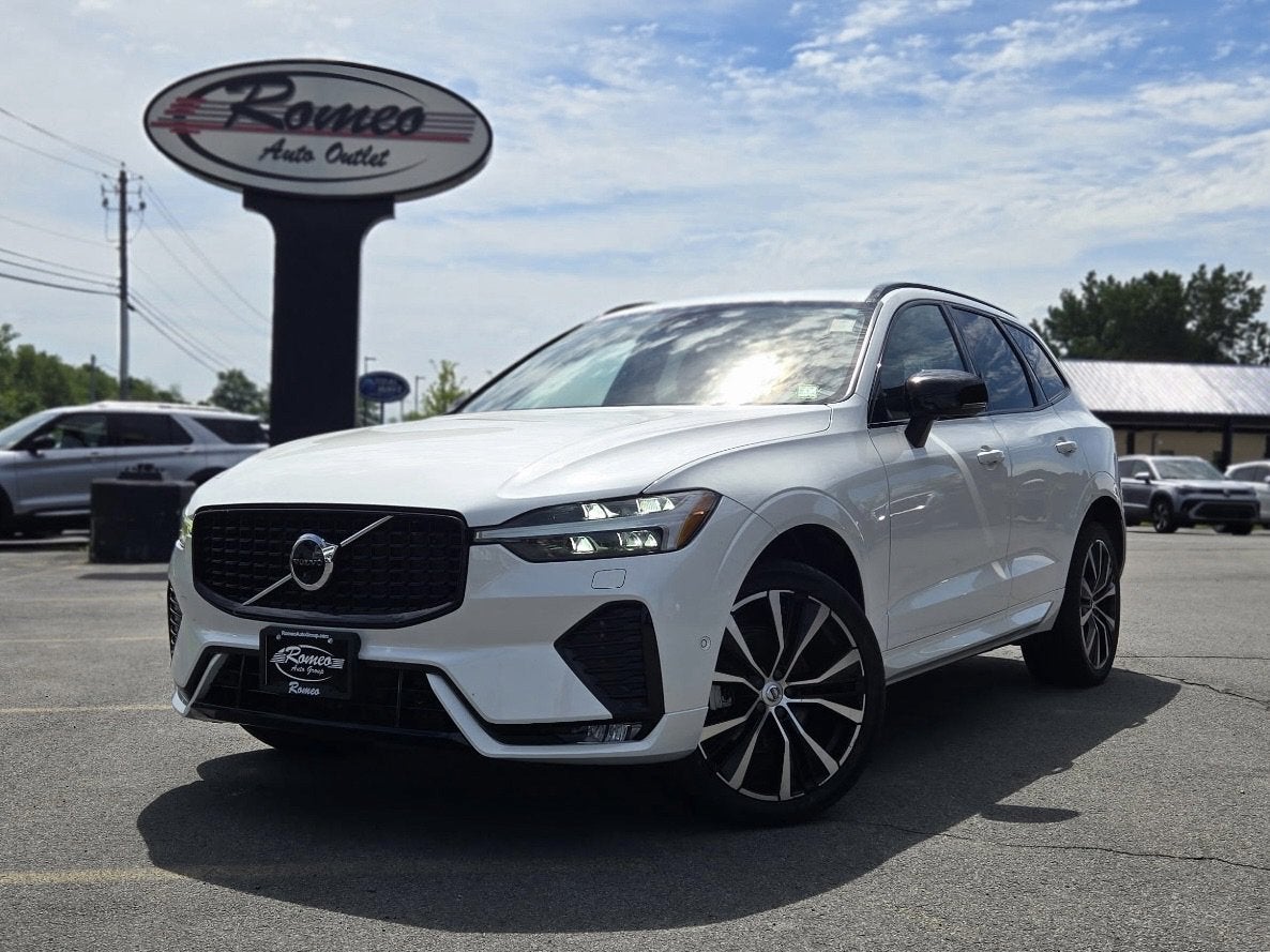 2023 Volvo XC60 B5 Plus Dark Theme in Crystal White — front three-quarter view